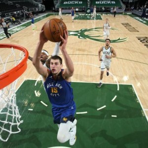 开云体育下载-50次三双紧追张伯伦 约基奇MVP表演肢解雄鹿